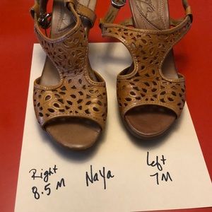 These Naya sling backs are in great condition. Notice different sizes!